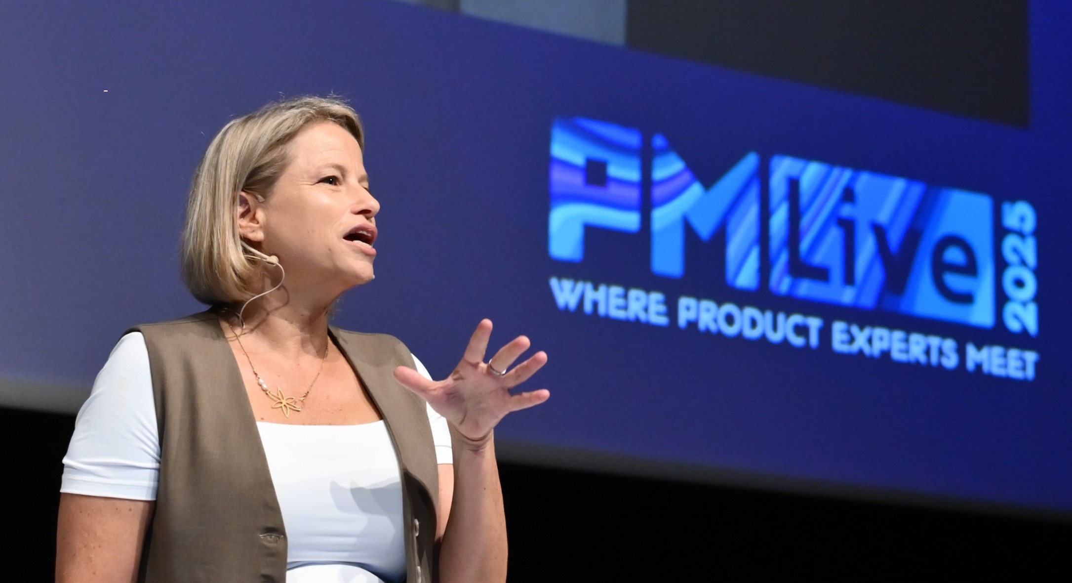 Nurit Peres speaking at PM Live 2025